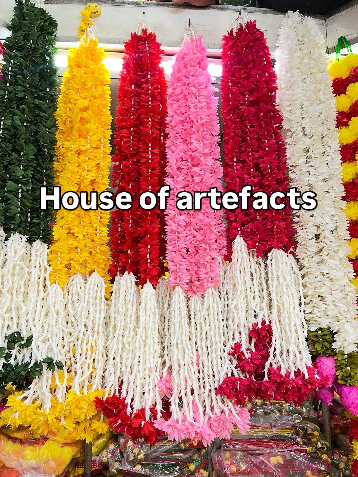 Colourful artificial floral garlands