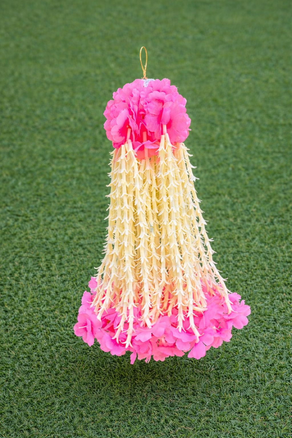 Pink and cream tasseled floral hanging decor piece