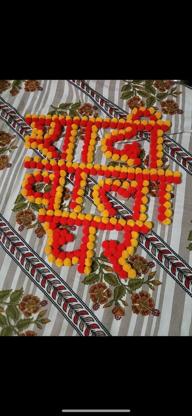 Shubh Labh pom-pom hanging